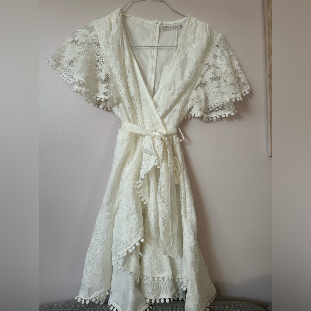 Ethereal Ivory Lace Wrap Dress with Pom Trim